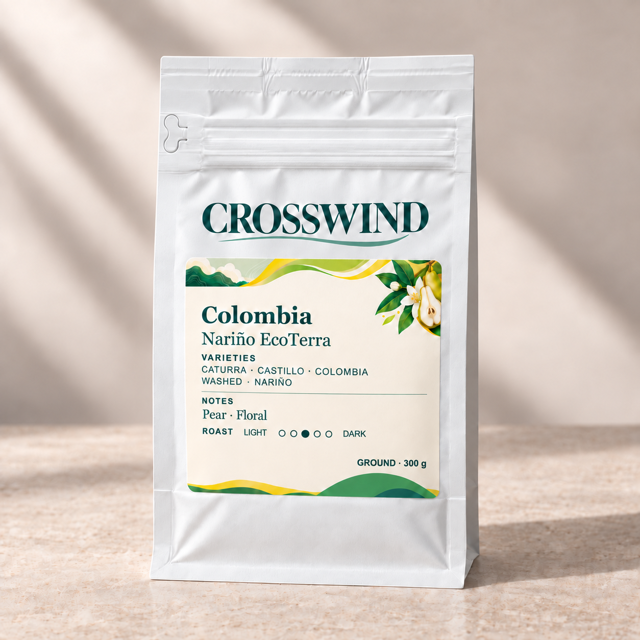 Colombia Nariño EcoTerra 300 g ground coffee in a sealed matte white pouch, labelled GROUND, with front zipper and left pull tab