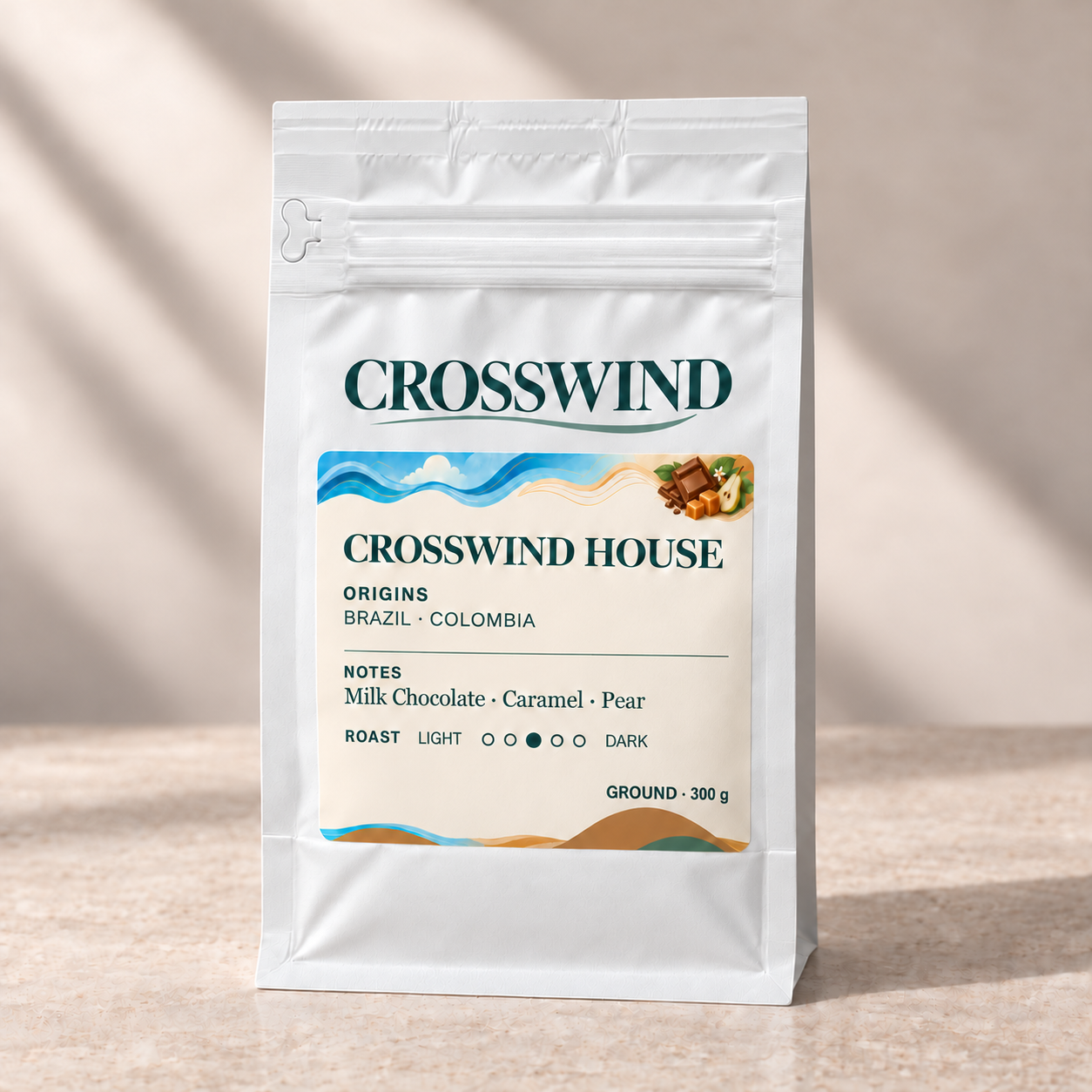 Crosswind House 300 g ground coffee in a sealed matte white pouch, labelled GROUND, with front zipper and left pull tab